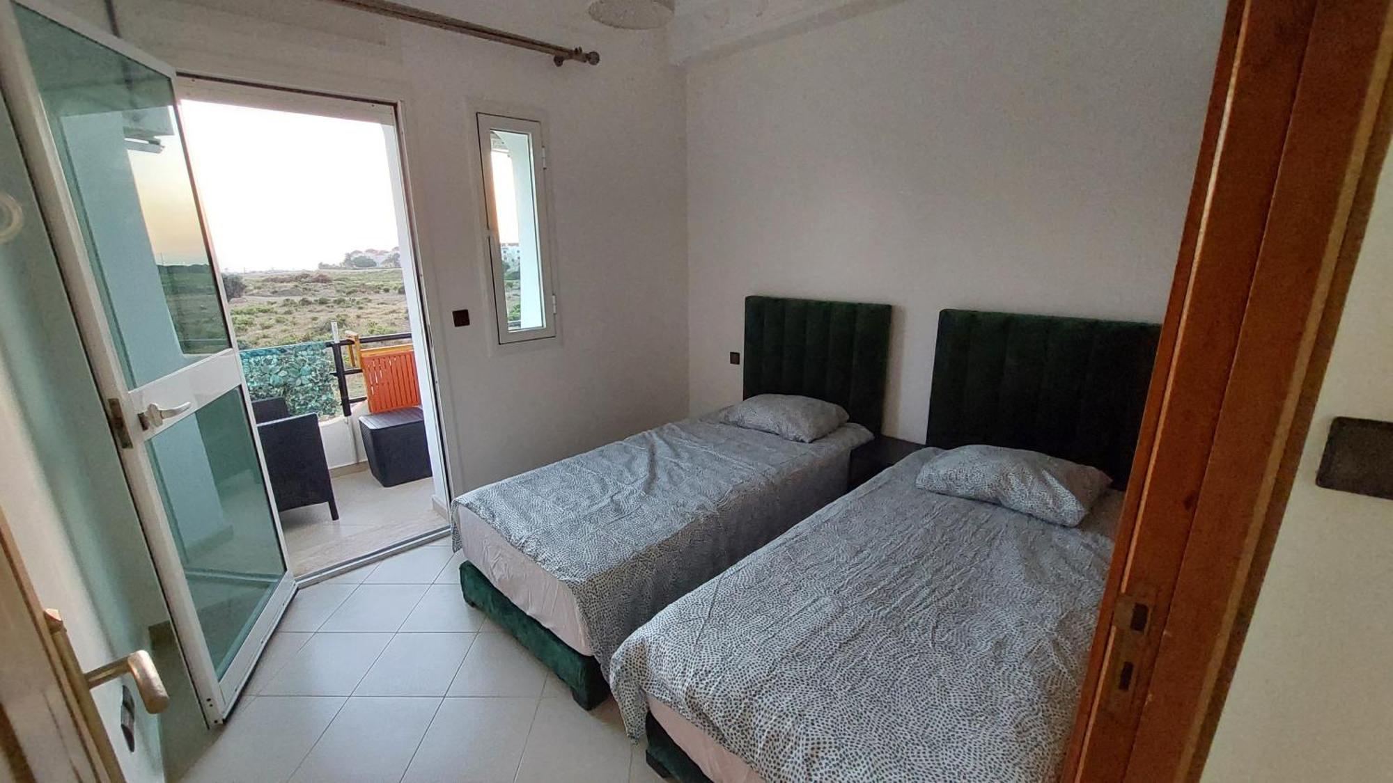Appartement Avec Piscines, Vue Sur Mer Et Acces A La Plage A Achakar Hill, Tanger. Exterior photo