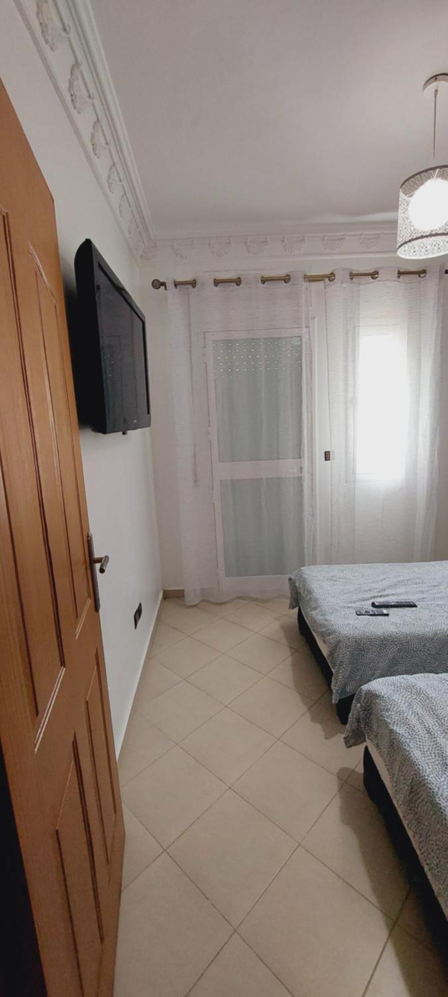 Appartement Avec Piscines, Vue Sur Mer Et Acces A La Plage A Achakar Hill, Tanger. Exterior photo